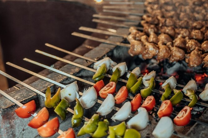Private Sunset Desert Safari:SandSurfing, Camel Ride & BBQ dinner - How dinner works: table service, live BBQ, and what’s included