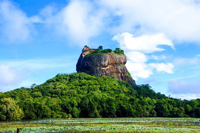Private Trip to Sigiriya, Dambulla & safari from Colombo/ Negombo - Dambulla Cave Temple: a focused hour of culture on the way