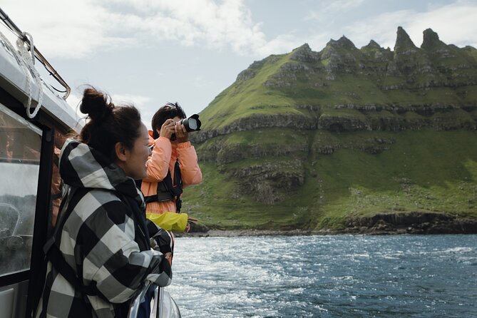 Puffin Safari Boat Tour - Stop 3: Múlafossur Waterfall That Drops Straight into the Atlantic