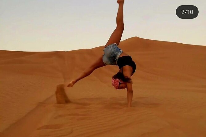 Quad Bike Dubai Desert Safari with BBQ Dinner Sandboard and Show - Sandboarding and camel riding: classic desert add-ons that feel different