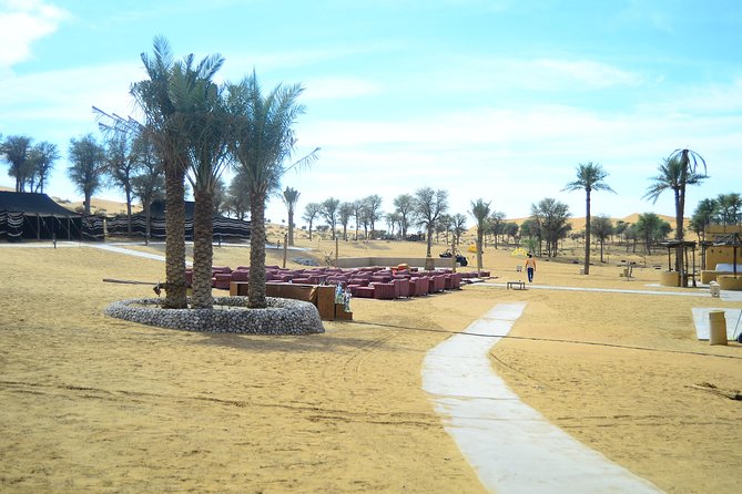 Ras Al Khaimah: Afternoon Desert Safari and BBQ Dinner - Camel ride, henna, and traditional costumes at camp