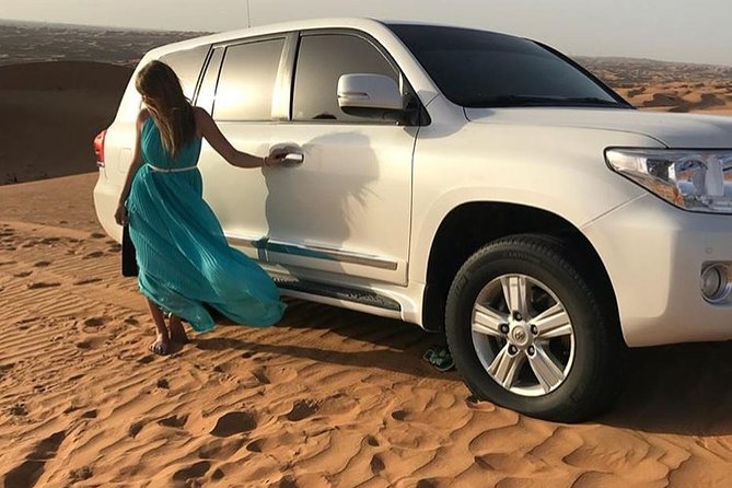 Red Dune 4x4 Desert Safari with Camel ride & BBQ Dinner - BBQ Dinner and Live Shows: Belly Dance, Fire, and Tanura