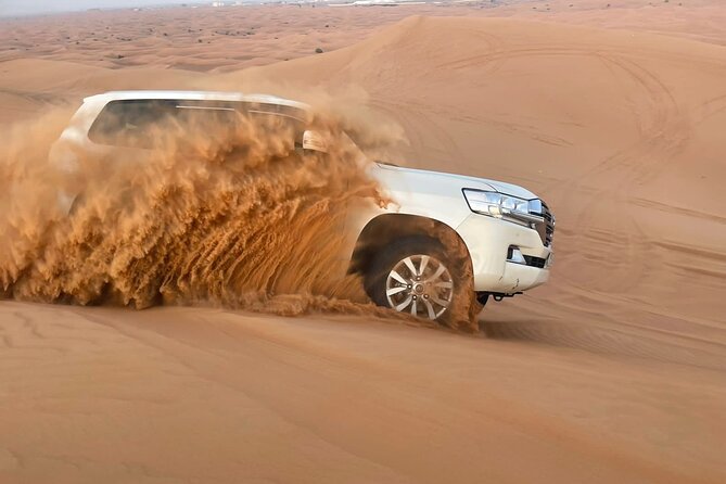 Red Dune 4x4 Desert Safari with Sand Boarding & Camel (4 hr) - The Short Camel Ride: A Classic Desert Moment