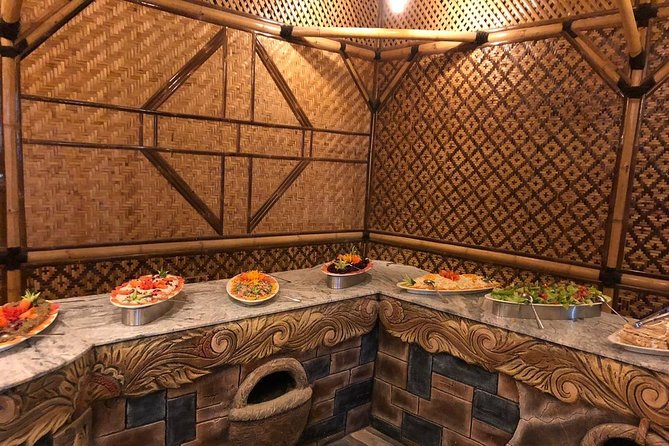 Red Dune Desert Safari & Quad Bike, BBQ Dinner. Camel Ride, Sandboarding - Desert camp dinner: BBQ, vegetarian options, and the show lineup