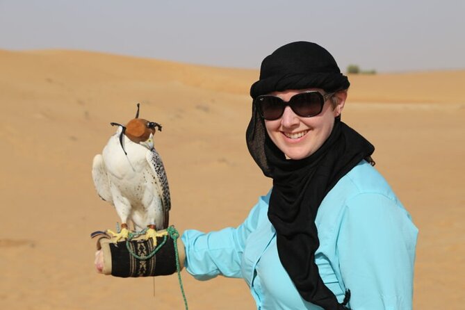 Red Dune Desert Safari with Dinner Quad Bike and Camel Ride - The shows: Tanura, belly dance, fire, and light plus live music
