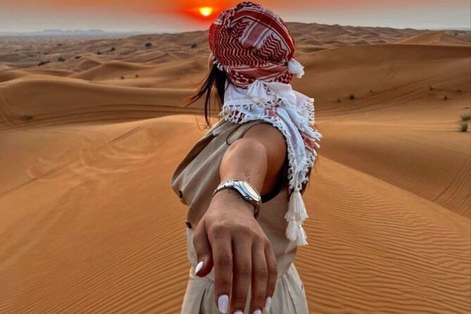 Red Dunes Desert Safari 4x4 Pickup & Drop, Camel Ride BBQ & Shows - Bedouin-style campsite time: camel ride, sandboarding, henna, costumes