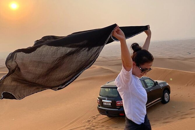Red Dunes Desert Safari Dubai with Dinner Buffet, Show & Transfer - Henna, Arabic Costumes, and the Camp Vibe