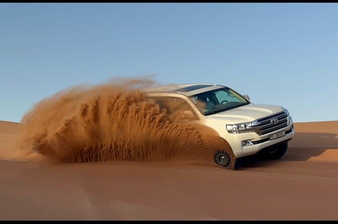 Red Dunes Desert Safari Dubai with Dinner Buffet, Show & Transfer - Live Shows: Belly Dance, Tanoura, and Fire Performers