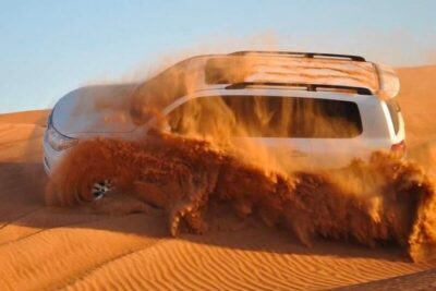 Red Dunes Desert Safari, Sand Board, Camel Ride with BBQ Dinner - Lehbab Red Dunes dune bashing: the rollercoaster part