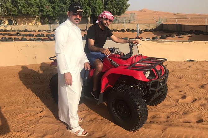 Red Dunes Safari with Sandboarding & Camel Ride from Ras Al Khayma - Sunset, Photo Stop, and Camel Riding at Desert Pace