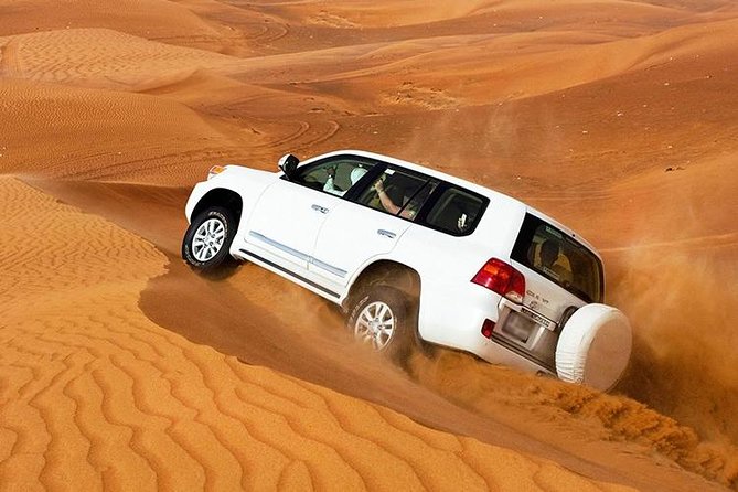 Red Dunes Safari with Sandboarding & Camel Ride from Ras Al Khayma - Desert Camp Dinner: BBQ, Soft Drinks, Henna, and Shisha
