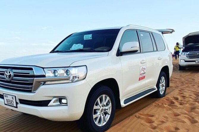 Red Sand Tourism desert safari with premium camp - Lahbab dune bashing and the sunset photo stop that keeps it fun