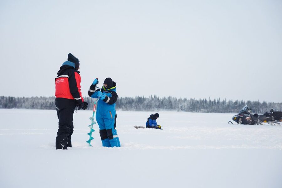 Rovaniemi: Ice Fishing & Snowmobile Safari Combo Day - Campfire warmth on the lake: sausages, hot drinks, and wildlife talk