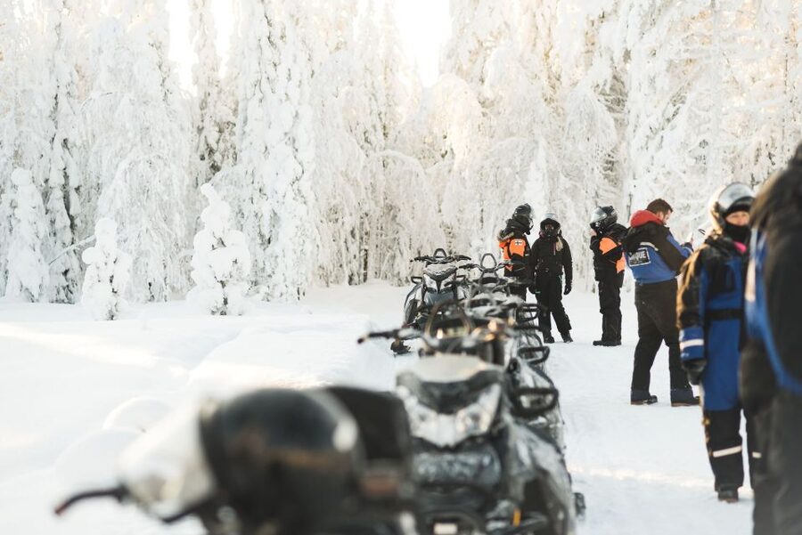 Rovaniemi: Snowmobile Safari into the Arctic Circle Forest - Family setup: kids in the sled, not strapped to the action