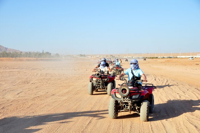 Safari Quad Bike Adventure, Camel, Show, Dinner & Stargazing - Quad bikes across the sands: safety, pacing, and the echo stop