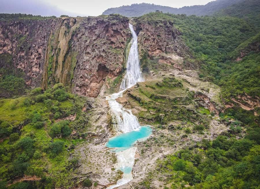Salalah: Wadi Darbat, Jabal Samhan, Baobab, Mirbat Sand Dune - Mirbat Sand Dunes: golden sands with mountain and sea nearby