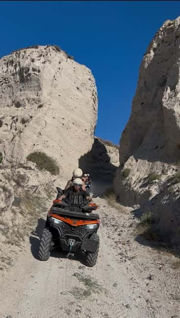 Santorini: ATV-Quad Off-Road Safari with Hidden Trails - Emporio: photo stop plus guided context in a historic-feeling village
