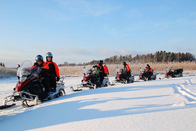 Snowmobile Safari in Helsinki Archipelago with Lunch - The convoy ride: frozen sea views and snowy forest trails