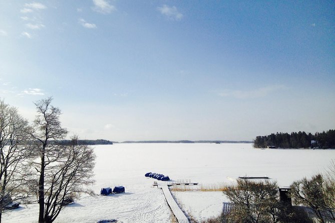 Snowmobile Safari in Helsinki Archipelago with Lunch - Ice fishing and kick sleds: the fun extras at the island stop