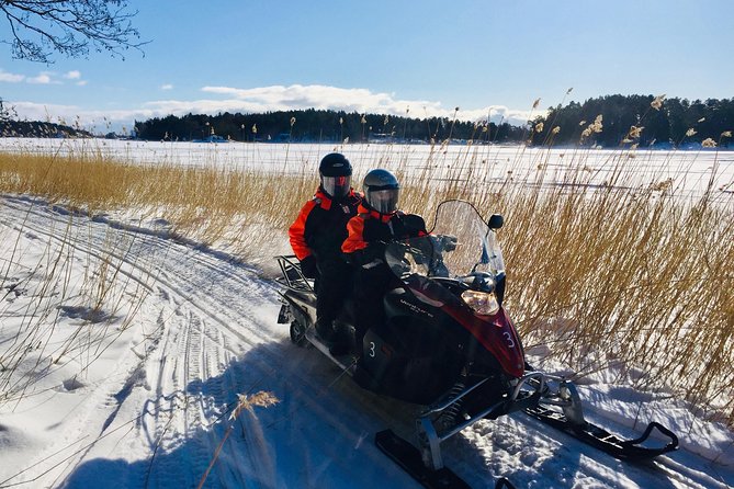 Snowmobile Safari in Helsinki Archipelago with Lunch - Who leads the day: Anders, Kenneth, and Henrik in the mix