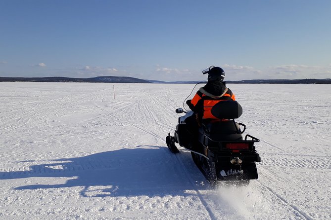 Snowmobile Safari to Lake Inari, meet & feed Reindeers, Lunch - The snowmobile safari to Lake Inari: shared power, frozen river vibes