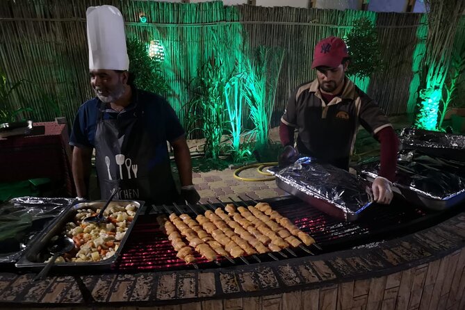 Standard Desert Safari 4X4 Pickup & Drop with Dinner & Live Shows - Falcon display, Arabian costumes, and the shisha lounge atmosphere