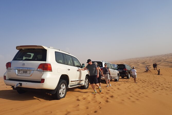 Sunrise Desert safari With Quad bike ride Sandboard & Camel ride - Dune Bashing with a Professional Guide: What to Expect