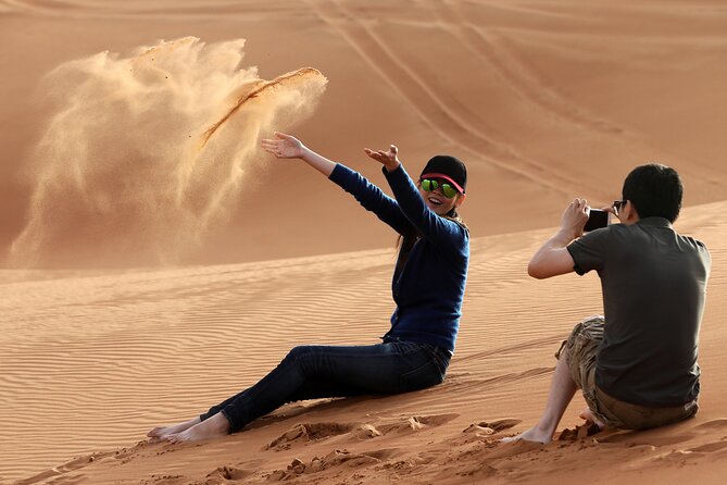 Sunset Camel Trek & Red Dunes Safari with BBQ at Al Khayma Camp From Dubai - Camel Trekking and Desert Animals: A 15-Minute Trek Plus Feeding