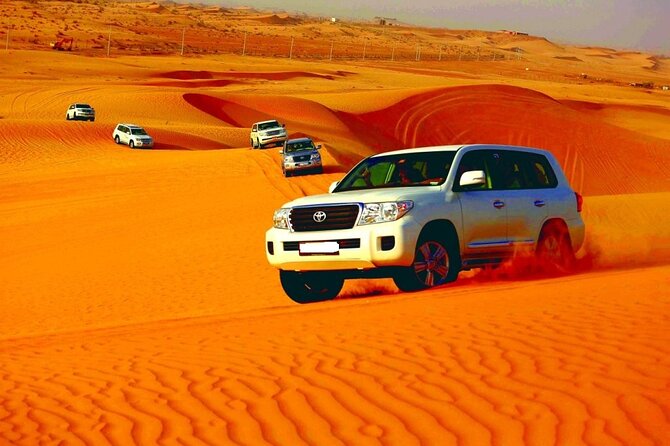 Sunset Desert Safari | Premium BBQ Dinner | Red Sand Dune - Traditional Entertainment: Belly Dance, Tanoura, and Fire