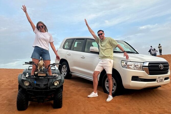 Sunset Desert Safari Quad bike Camel ride Sand Board & BBQ Dinner - Stop 2: Al Awir Camel Ride, Henna Art, and Live Arabic Entertainment