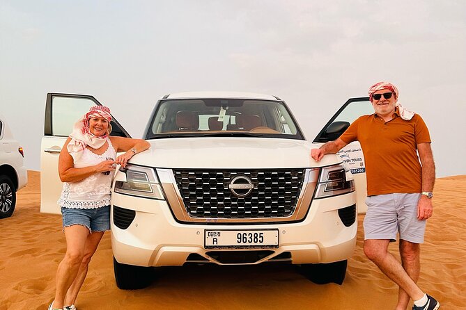 Sunset Desert safari with Camel Ride Sand Board & BBQ Dinner - Dune Bashing and Sandboarding: The Adrenaline Core