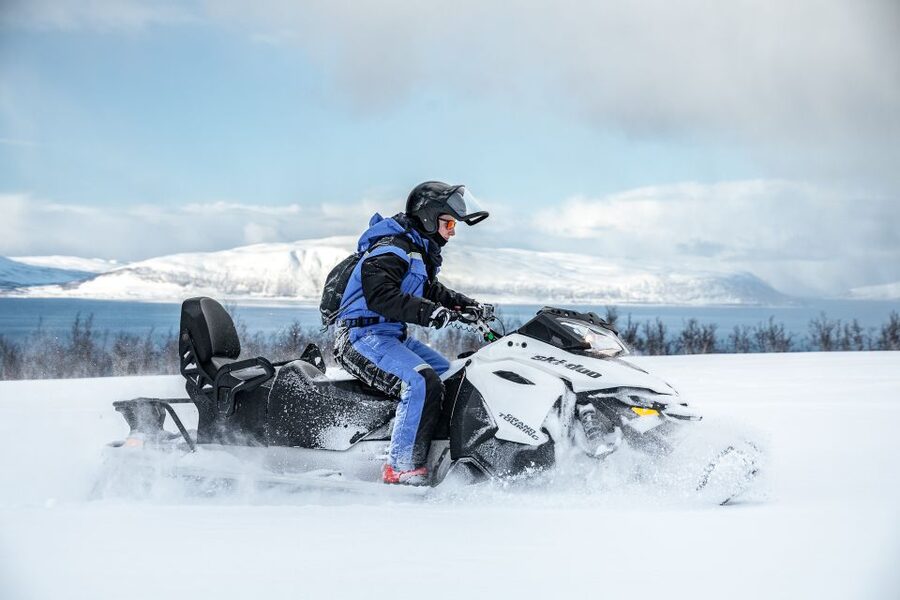 Tromsø: Scenic Arctic snowmobile safari in the Lyngen Alps - The full day flow: Prostneset, bus, ferry, and getting to the snowmobile area