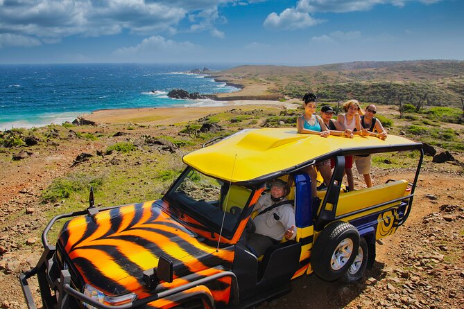 Ultimate Island Jeep Safari with Natural Pool, Baby Beach & Lunch - Cultural Photo Stops Before the Ride Back: Alto Vista and Seafarer Memorial