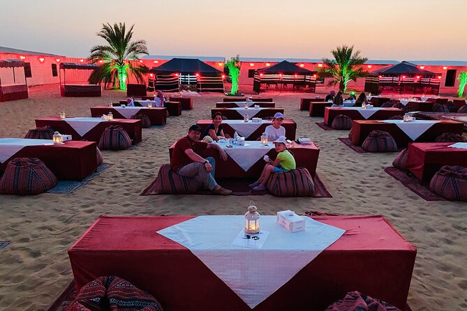 VIP Evening Desert Safari with Camel Ride & BBQ Dinner–Shared Car - Live shows after sunset: belly dance, fire, and Tanoura