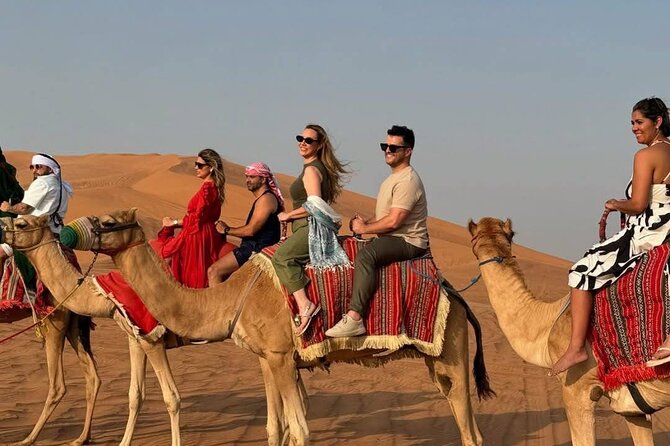 Vip Evening Desert Safari with quad bike,Camel Riding & Dinner - Lahbab Red Sand Desert: dune bashing, quad biking, and sandboarding