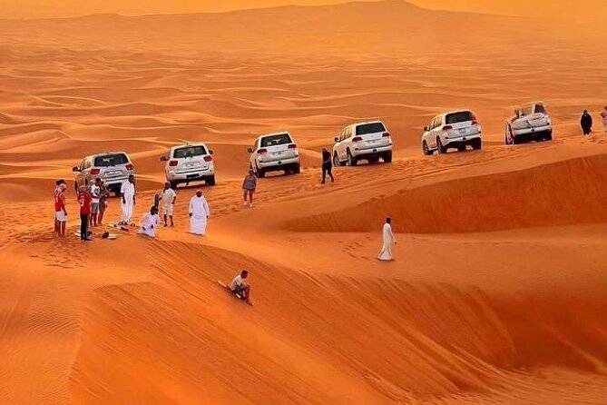VIP Service | Red Dunes Sunset Desert Safari With BBQ Dinner - Dune bashing in a Land Cruiser: fast, loud, and built for photos